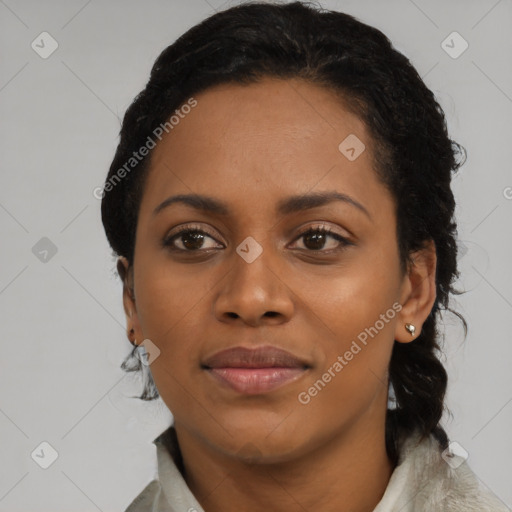 Joyful black young-adult female with medium  black hair and brown eyes