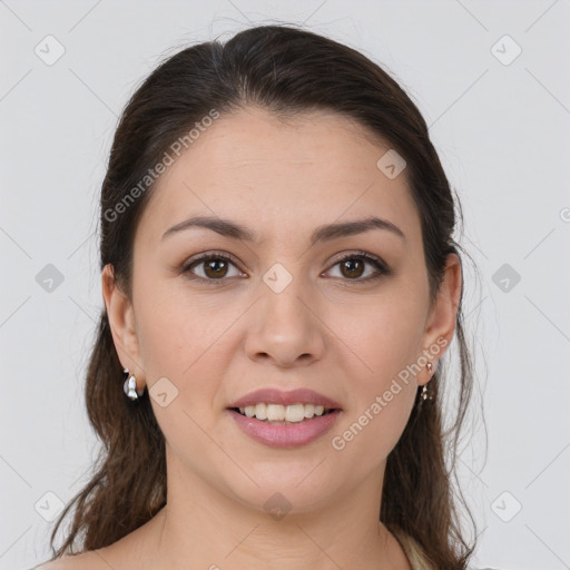 Joyful white young-adult female with medium  brown hair and brown eyes