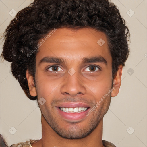 Joyful black young-adult male with short  brown hair and brown eyes