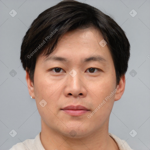 Neutral asian young-adult male with short  brown hair and brown eyes