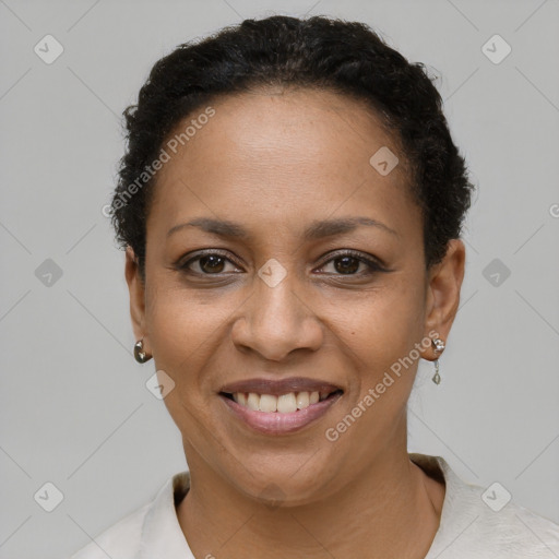 Joyful latino young-adult female with short  brown hair and brown eyes