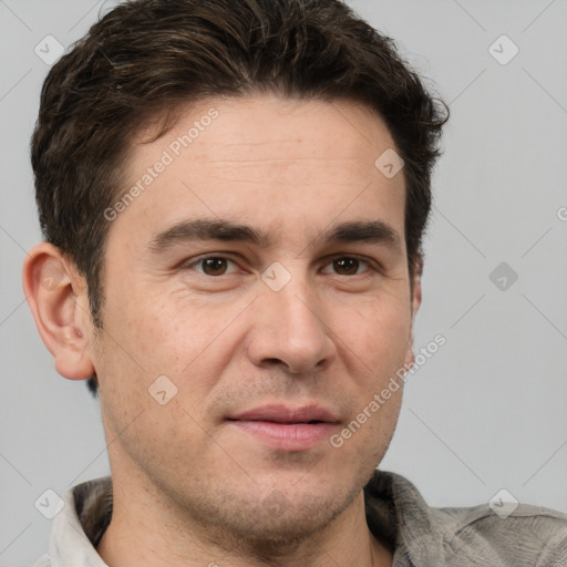 Joyful white adult male with short  brown hair and grey eyes