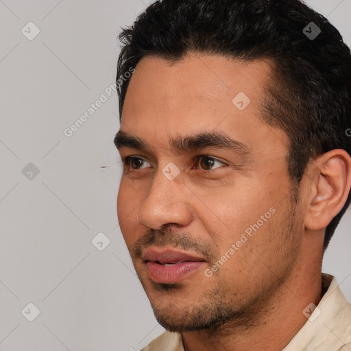 Joyful white young-adult male with short  black hair and brown eyes