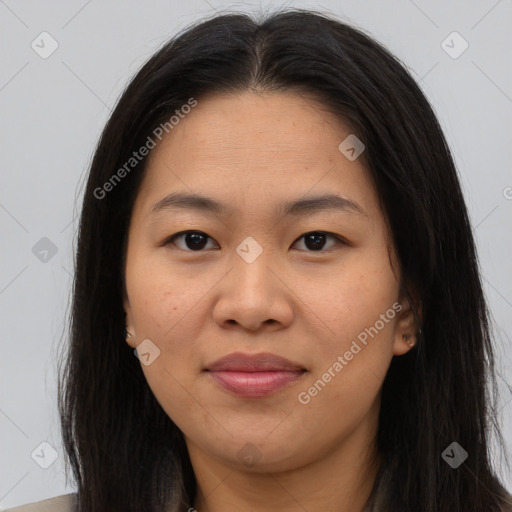 Joyful asian young-adult female with long  brown hair and brown eyes