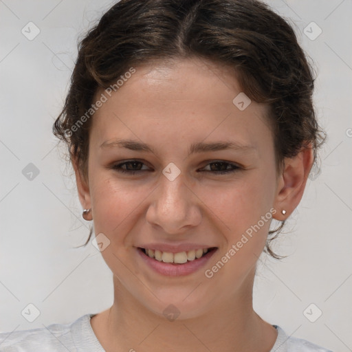 Joyful white child female with medium  brown hair and brown eyes