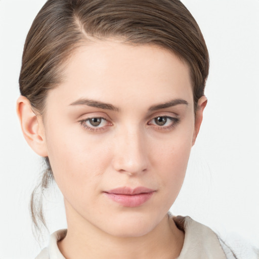 Neutral white young-adult female with medium  brown hair and brown eyes