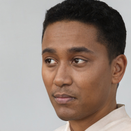 Neutral black young-adult male with short  black hair and brown eyes