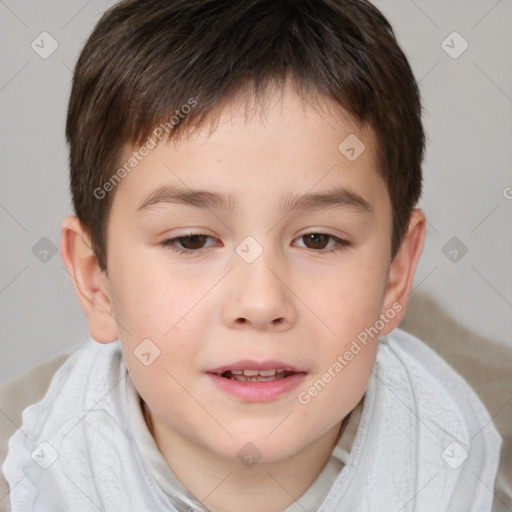 Joyful white child male with short  brown hair and brown eyes