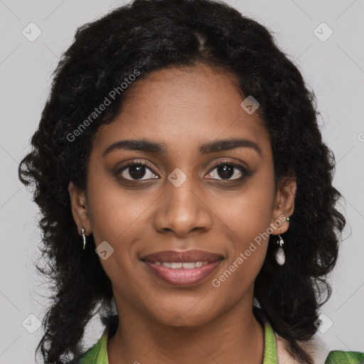 Joyful black young-adult female with medium  black hair and brown eyes