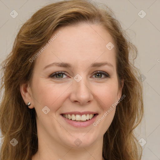 Joyful white young-adult female with long  brown hair and green eyes