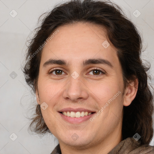 Joyful white adult female with medium  brown hair and brown eyes