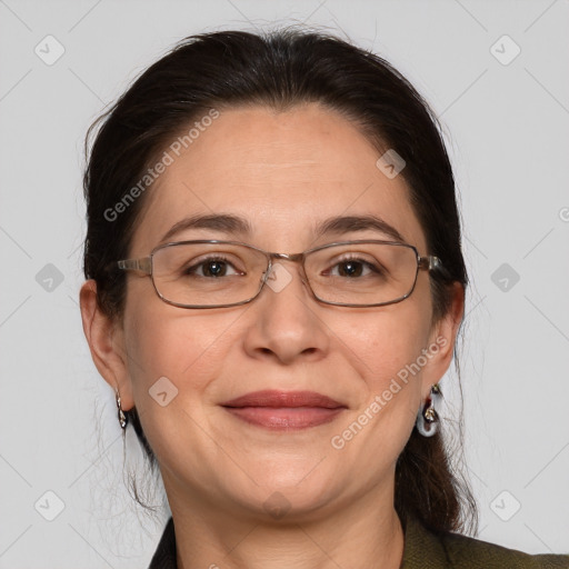 Joyful white adult female with medium  brown hair and grey eyes