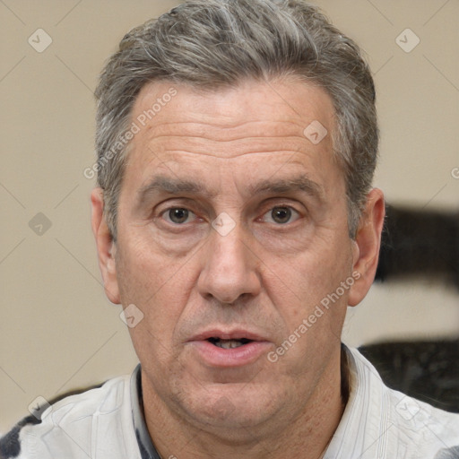 Joyful white middle-aged male with short  brown hair and brown eyes