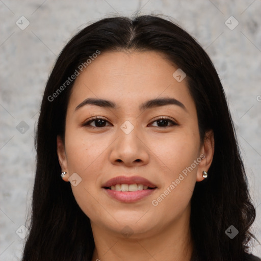 Joyful asian young-adult female with long  brown hair and brown eyes