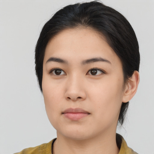 Neutral asian young-adult female with medium  black hair and brown eyes