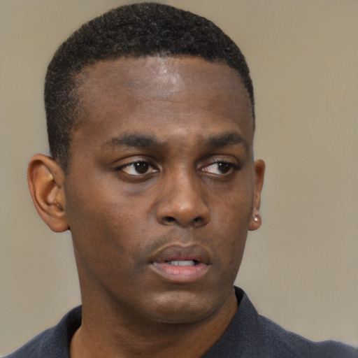 Neutral black young-adult male with short  brown hair and brown eyes
