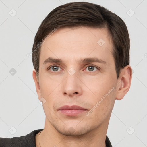 Neutral white young-adult male with short  brown hair and brown eyes