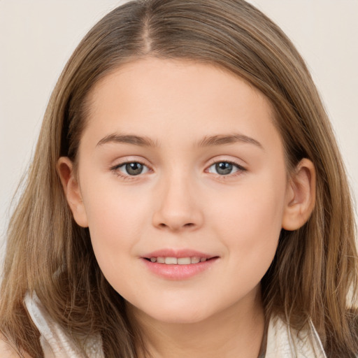 Joyful white child female with long  brown hair and brown eyes