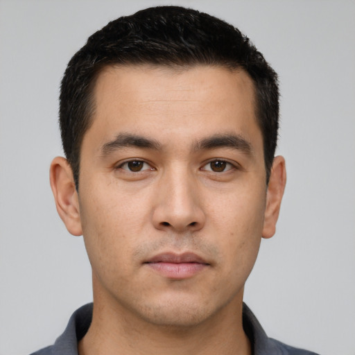 Neutral asian young-adult male with short  black hair and brown eyes
