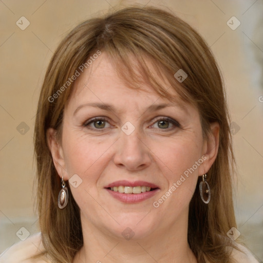 Joyful white adult female with medium  brown hair and grey eyes