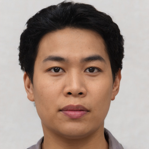 Neutral asian young-adult male with short  black hair and brown eyes