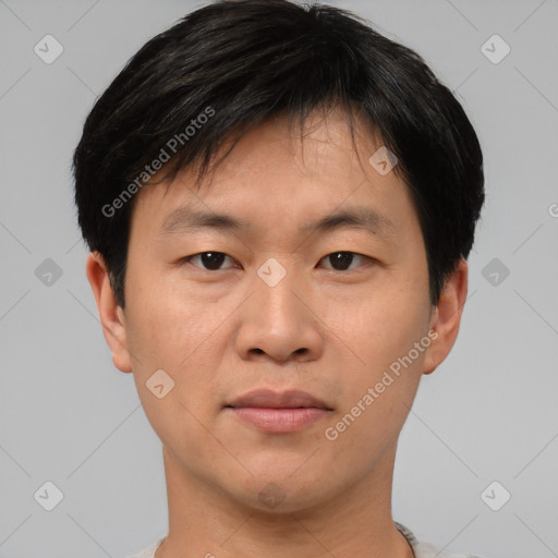 Neutral asian young-adult male with short  brown hair and brown eyes