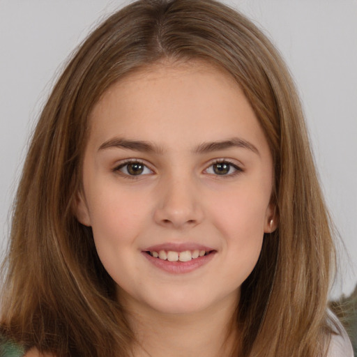 Joyful white child female with long  brown hair and brown eyes