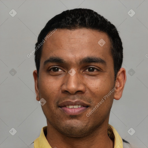 Joyful latino young-adult male with short  black hair and brown eyes