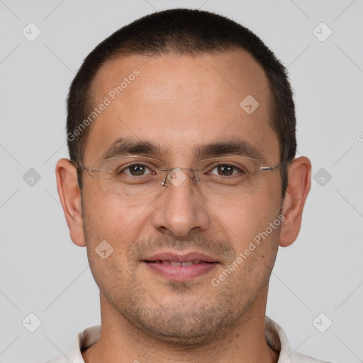 Joyful white adult male with short  brown hair and brown eyes