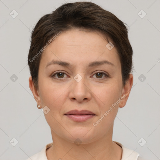 Joyful white young-adult female with short  brown hair and brown eyes