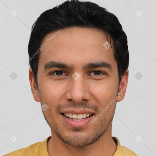 Joyful white young-adult male with short  black hair and brown eyes