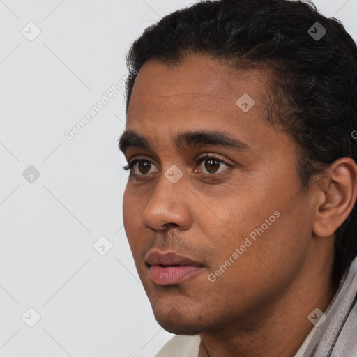 Neutral latino young-adult male with short  black hair and brown eyes