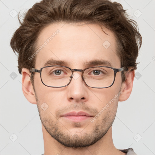 Neutral white young-adult male with short  brown hair and grey eyes