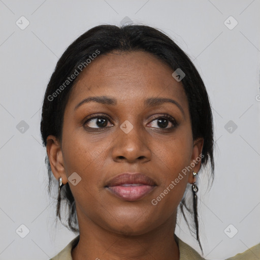 Joyful black young-adult female with medium  black hair and brown eyes