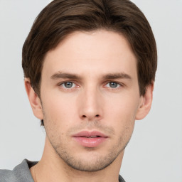 Neutral white young-adult male with short  brown hair and grey eyes