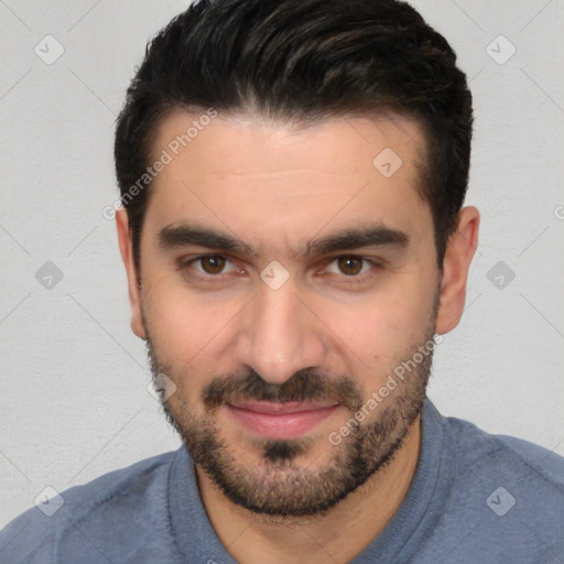 Joyful white young-adult male with short  black hair and brown eyes