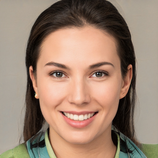 Joyful white young-adult female with medium  brown hair and brown eyes