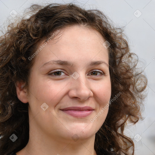 Joyful white adult female with long  brown hair and brown eyes