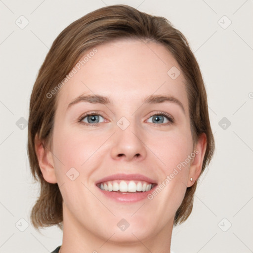 Joyful white young-adult female with medium  brown hair and blue eyes