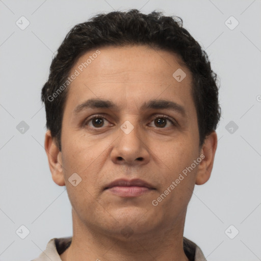 Neutral latino young-adult male with short  brown hair and brown eyes