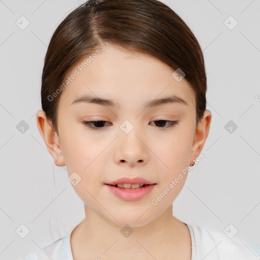 Joyful white child female with short  brown hair and brown eyes