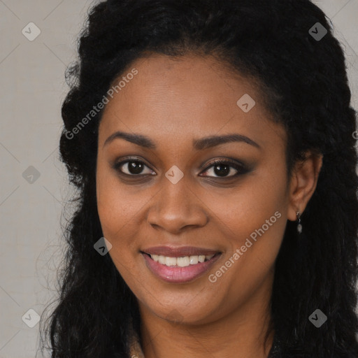 Joyful black young-adult female with long  brown hair and brown eyes