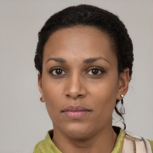 Neutral latino young-adult female with short  black hair and brown eyes