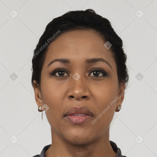 Joyful latino young-adult female with short  black hair and brown eyes