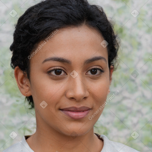 Joyful latino young-adult female with short  brown hair and brown eyes