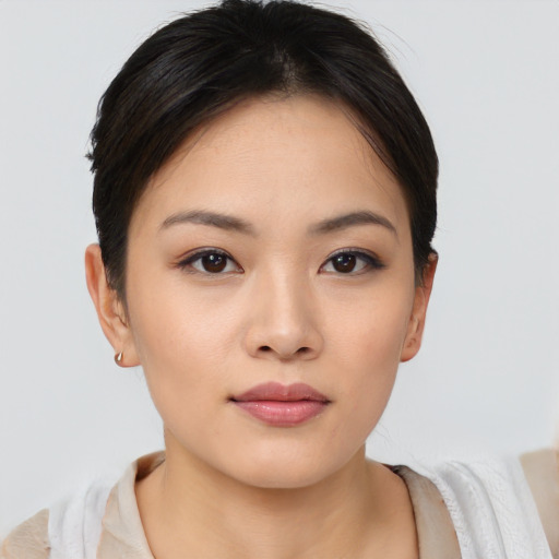 Neutral asian young-adult female with short  brown hair and brown eyes