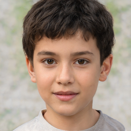 Joyful white child male with short  brown hair and brown eyes