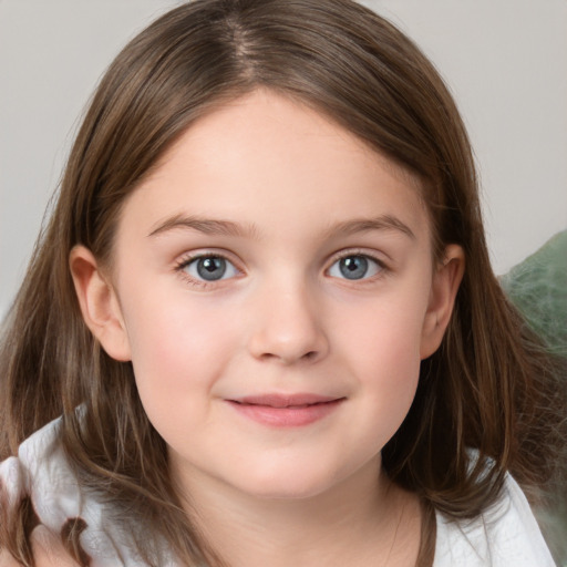 Joyful white child female with medium  brown hair and grey eyes