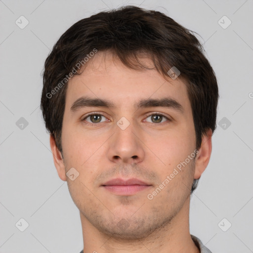 Neutral white young-adult male with short  brown hair and brown eyes