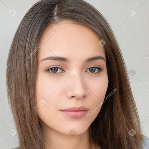 Neutral white young-adult female with long  brown hair and brown eyes